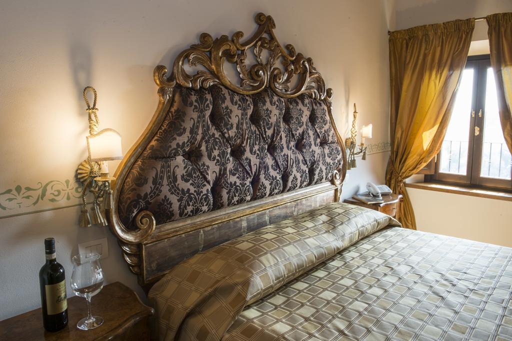 Готель Palazzo Pacini Колле-ді-Валь-д'Ельса Номер фото